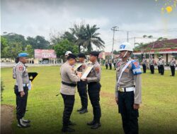Kapolres Dharmasraya Pimpin Langsung Upacara PTDH: Penegakan Disiplin Dua Personel Polri